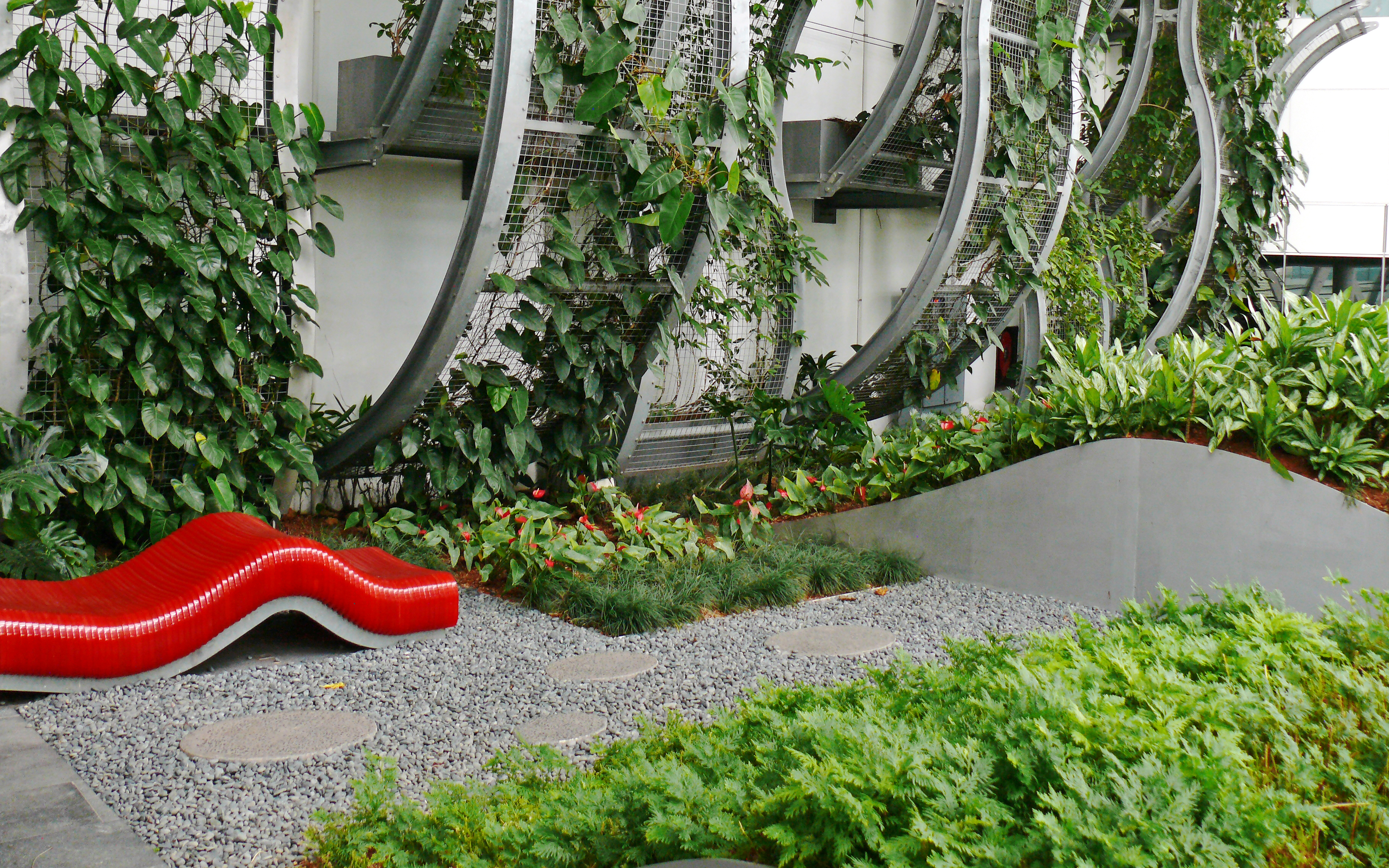 Vertical greening and red sunbed infront