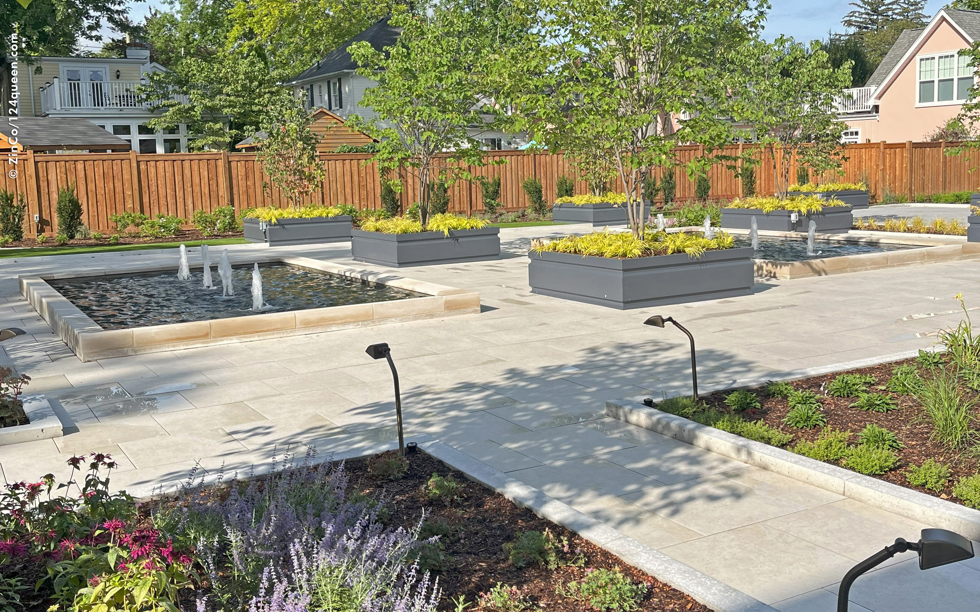 Walkways, water features and raised plant beds