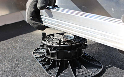 Retainer clips are clipped onto the Elefeet® pedestals