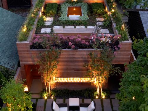 Roof garden with pond at night
