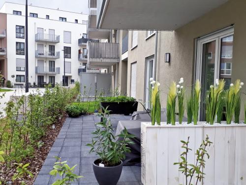 Decorated patios in front of residential flats 