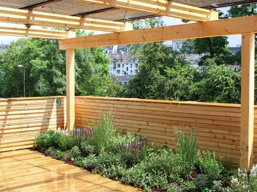 Wooden pergola with PV tubes