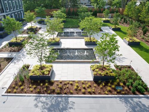 Garden with plant beds, lawn, water features and walkways