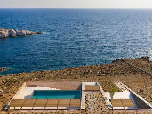 Private property with a swimming pool and a view onto the sea