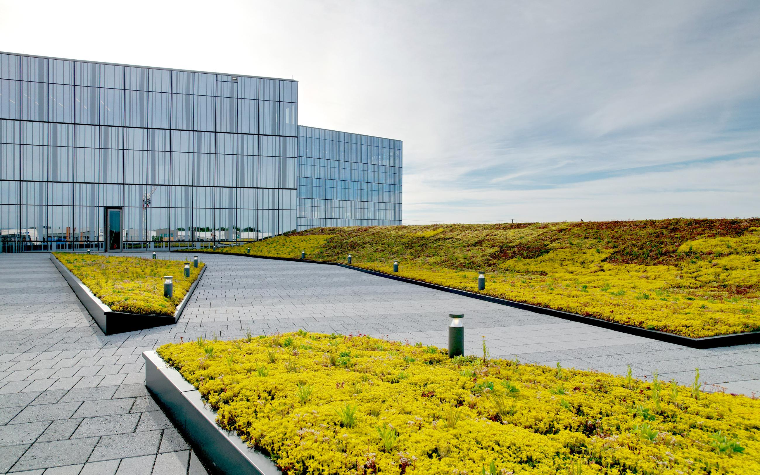 Image showcasing The steepest green roof in Ontario - roof pitch up to 50° | ZinCo Green ...