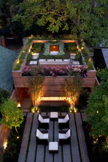 Carport in Toronto (Canada), ZinCo system build-up ”Roof Garden“. Roof garden with pond at night