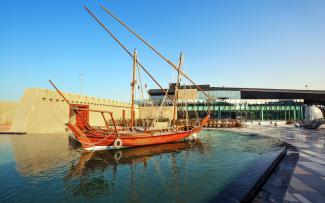 Wooden boat in a water basin