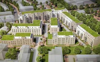 The residential development Noltemeyer Hoefe in Braunschweig is characterised by a “Stormwater Management Roof” of 5,780 m² as an intensive green roof and 2,500 m² of extensive green roof with photovoltaic elements. © Schmeing Bau GmbH Bird's eye view of extensive green roofs on residential blocks