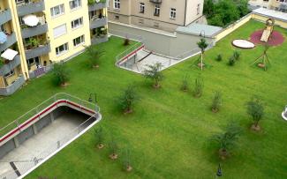 Green recreational spaces have a direct impact on human health in urban settings – green reduces stress and strengthens the immune system. Green roof with lawn on top of an underground garage