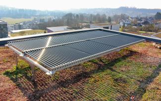 Extensive green roof with PV tubes