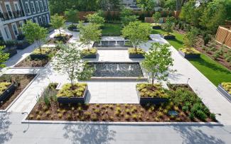 Garden with plant beds, lawn, water features and walkways