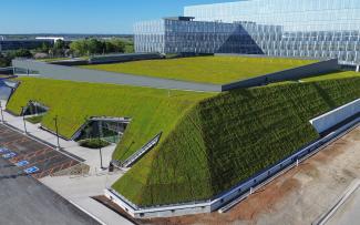 The events hall of the LiUNA Local 183 building complex is literally encased in green areas. Pitched green roof