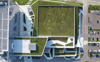 In all, four different ZinCo system build-ups were used to green the most diverse roof areas. Bird's eye view onto a green roof