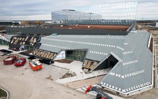 On the pitched roof areas, aluminium edging profiles are attached to the ZinCo’s “Shear Fix LF 600” brackets creating Shear Barrier Lines to retain the green roof and prevent it from slipping. Installation of a green roof